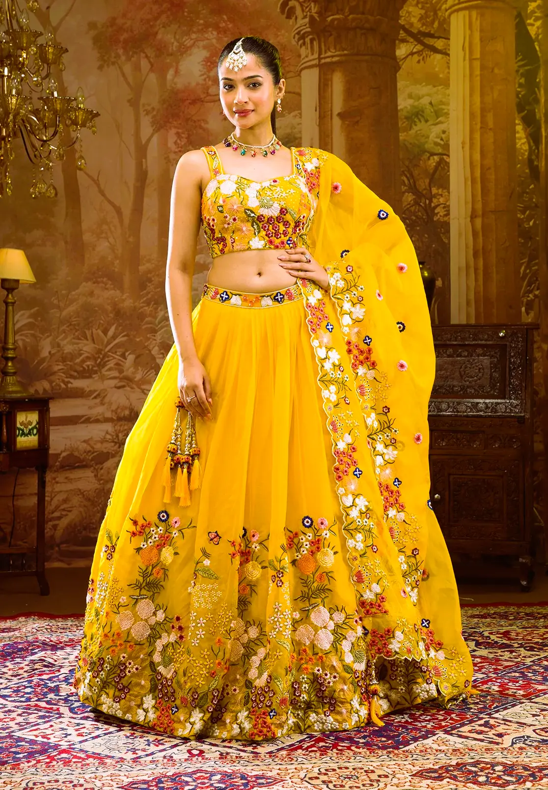 Girl pic showing the yellow lightweight tissue LEHENGA by koskii